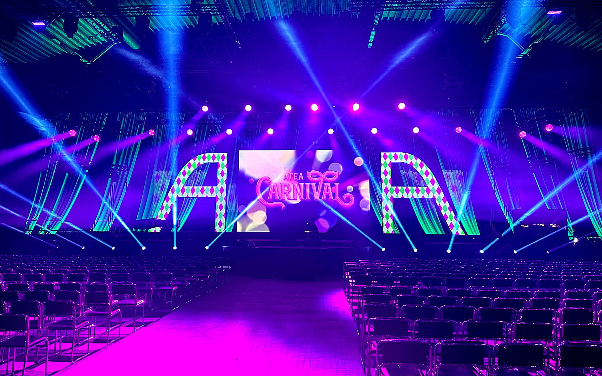 Illuminated fabric layers backstage for evening carnival set design, ATEA Boson