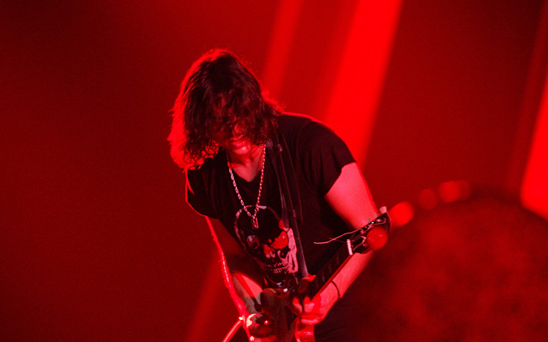 Edgey Pires guitarist of The Last Internationale live at corporate event Boson
