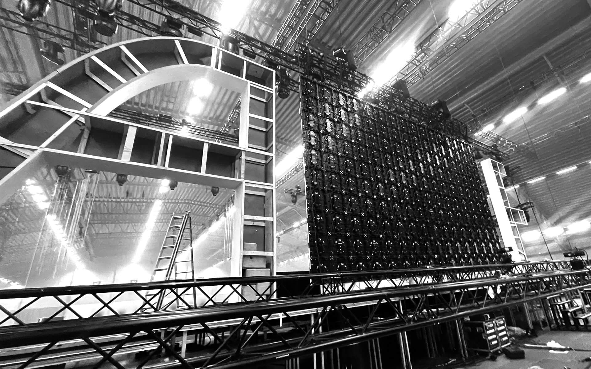 LED screen and carpentry letter A structures backstage during construction, ATEA Boson 2023