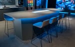 Specialbyggt konferensbord med integrerad konferensteknik, Atlas Copco Experience Studio