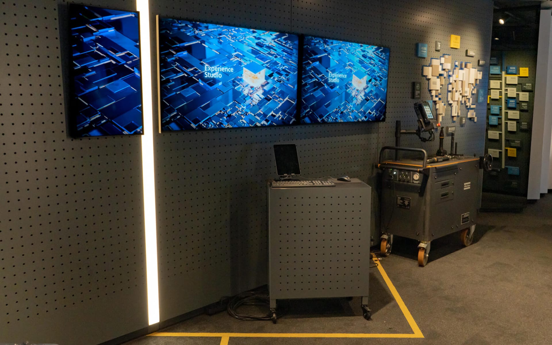 Exhibition area with custom display furniture for Atlas Copco products, showroom Sickla