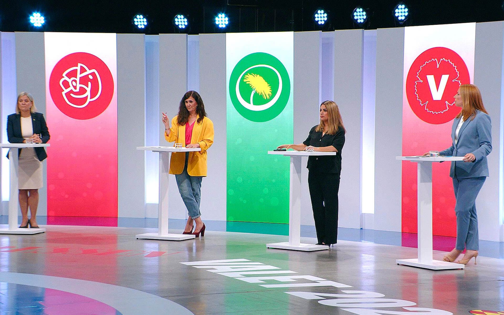 Close-up of backlit wooden panels and LED screens in set design wall, Expressen party leaders debate 2022