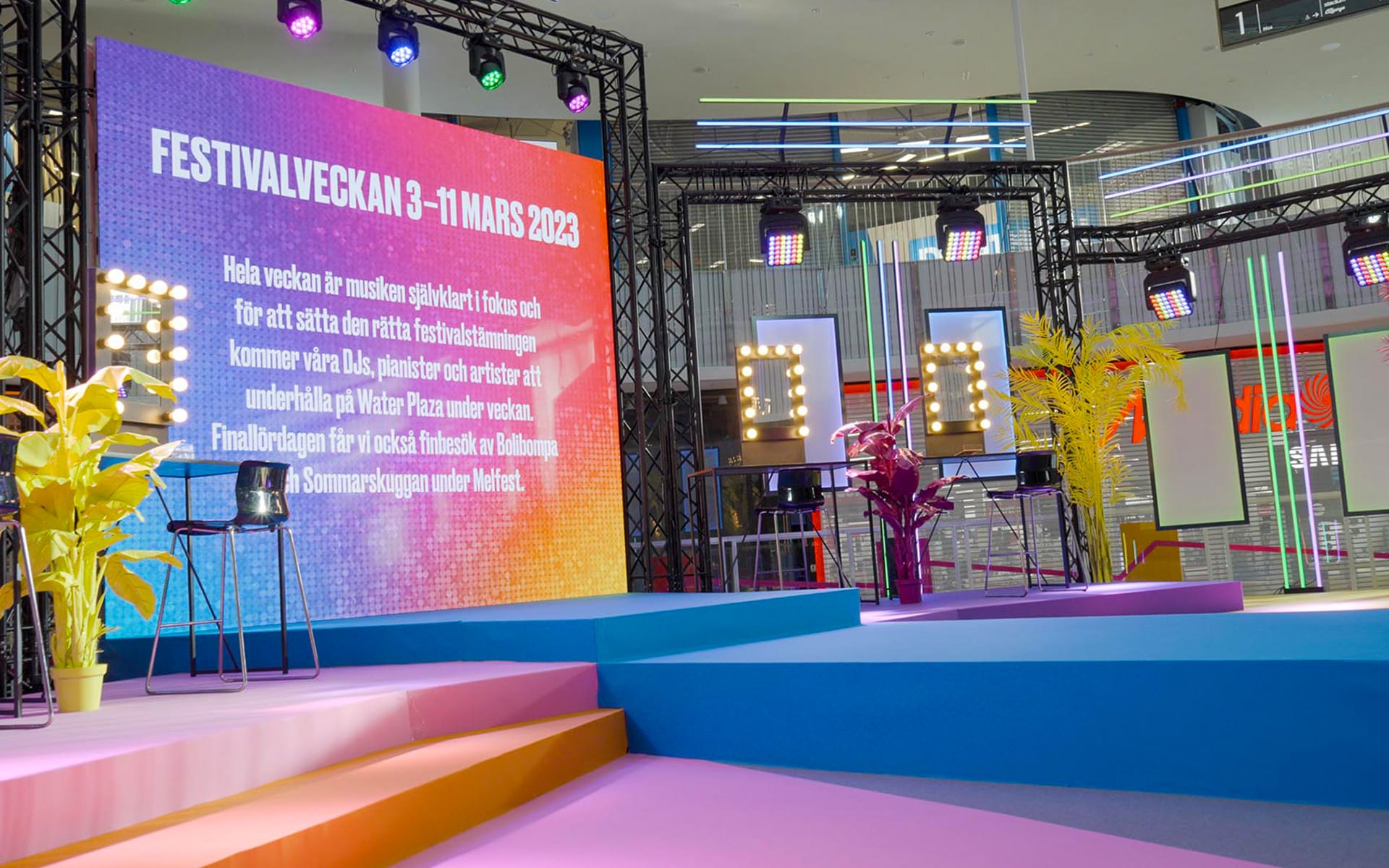 Large high-resolution LED screen in arched truss structure, Festival Week Mall of Scandinavia 2023