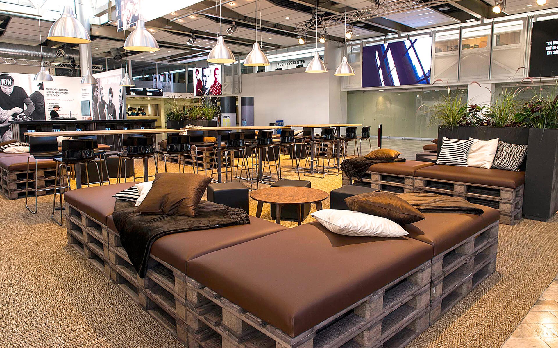 Sofa built from pallets with decorative cushions, Goldwell Global Zoom Stockholmsmässan 2016