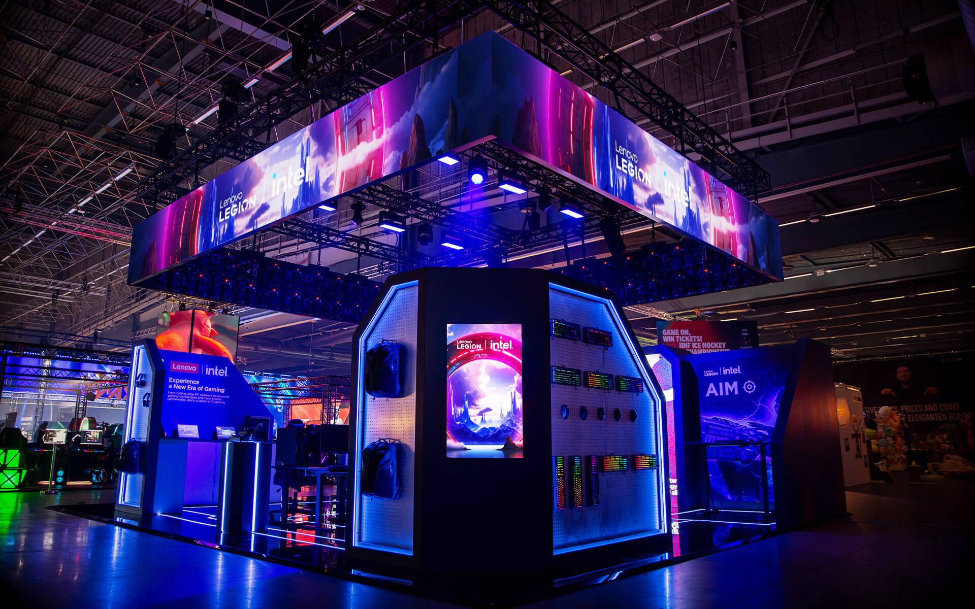 Four-sided LED banner in the truss above the booth