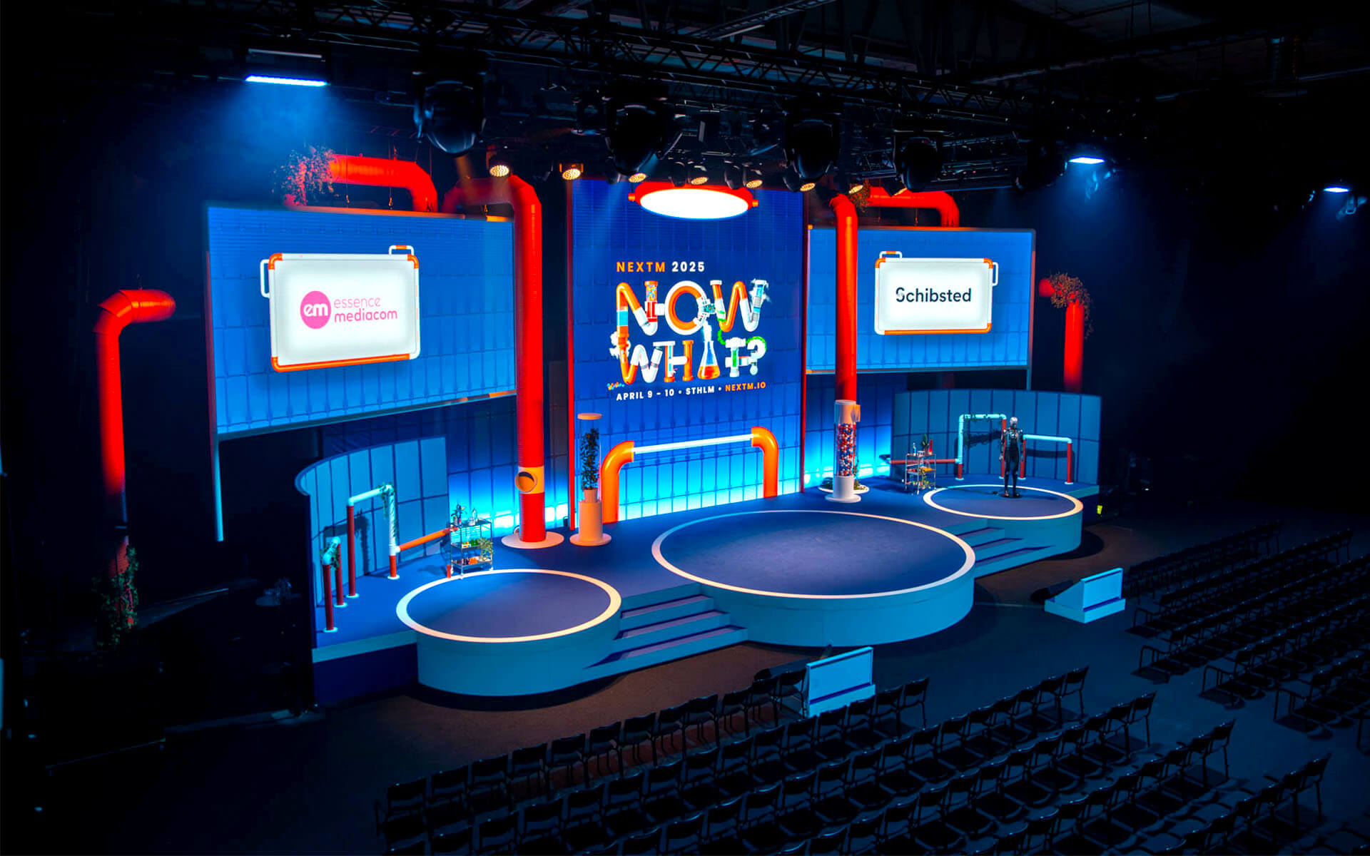 NextM 2025 main stage with rounded shape and LED wall