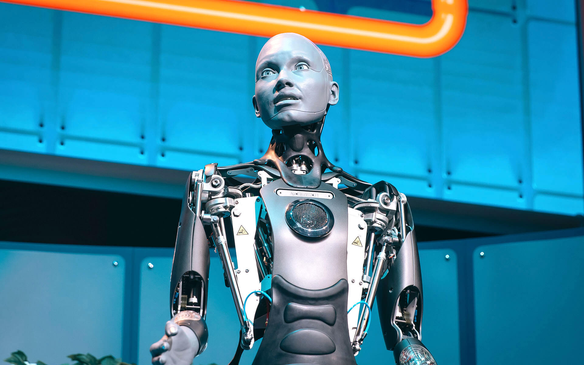 AI theme and robot on stage during NextM 2025