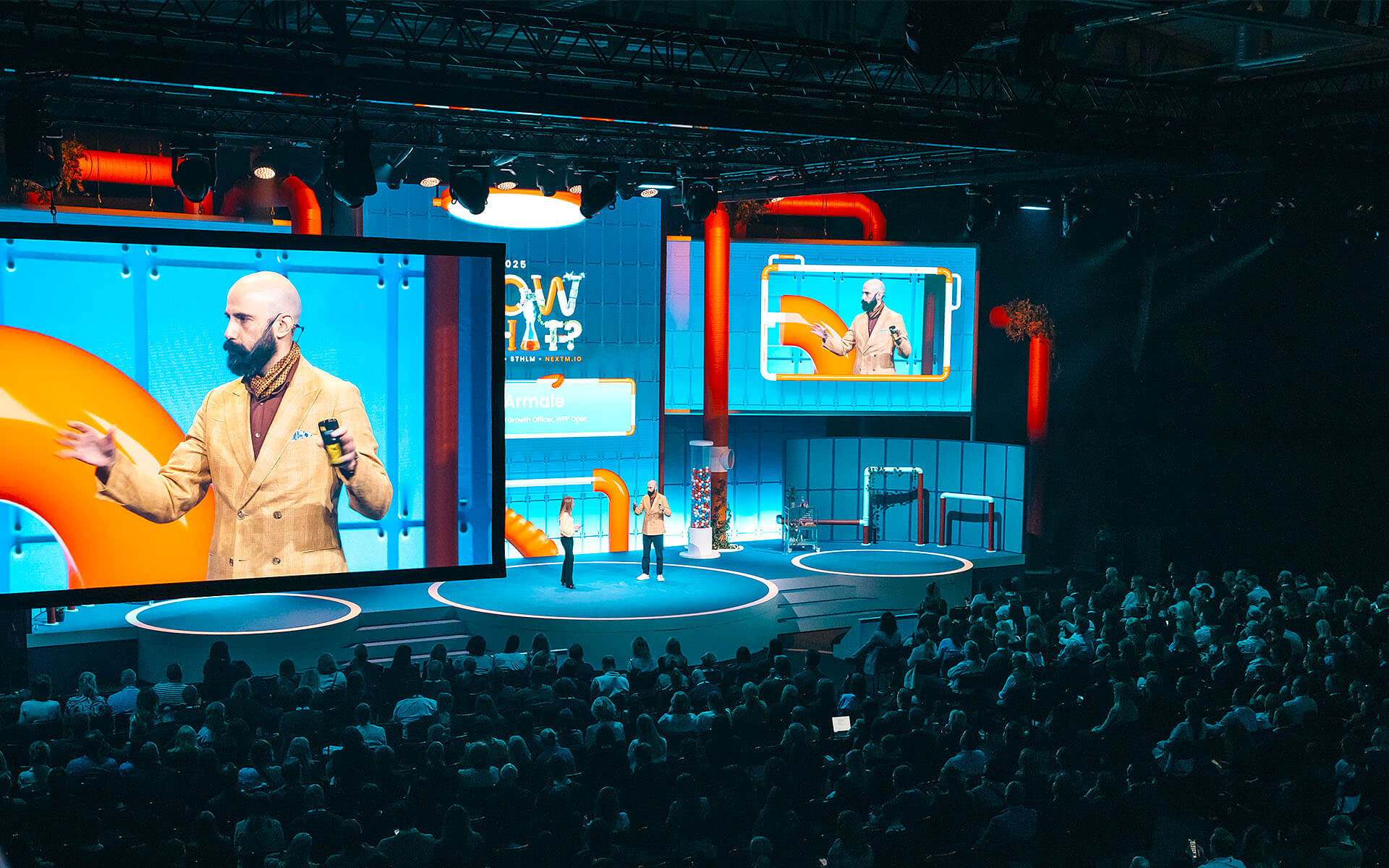 Lecturer on stage during NextM 2025