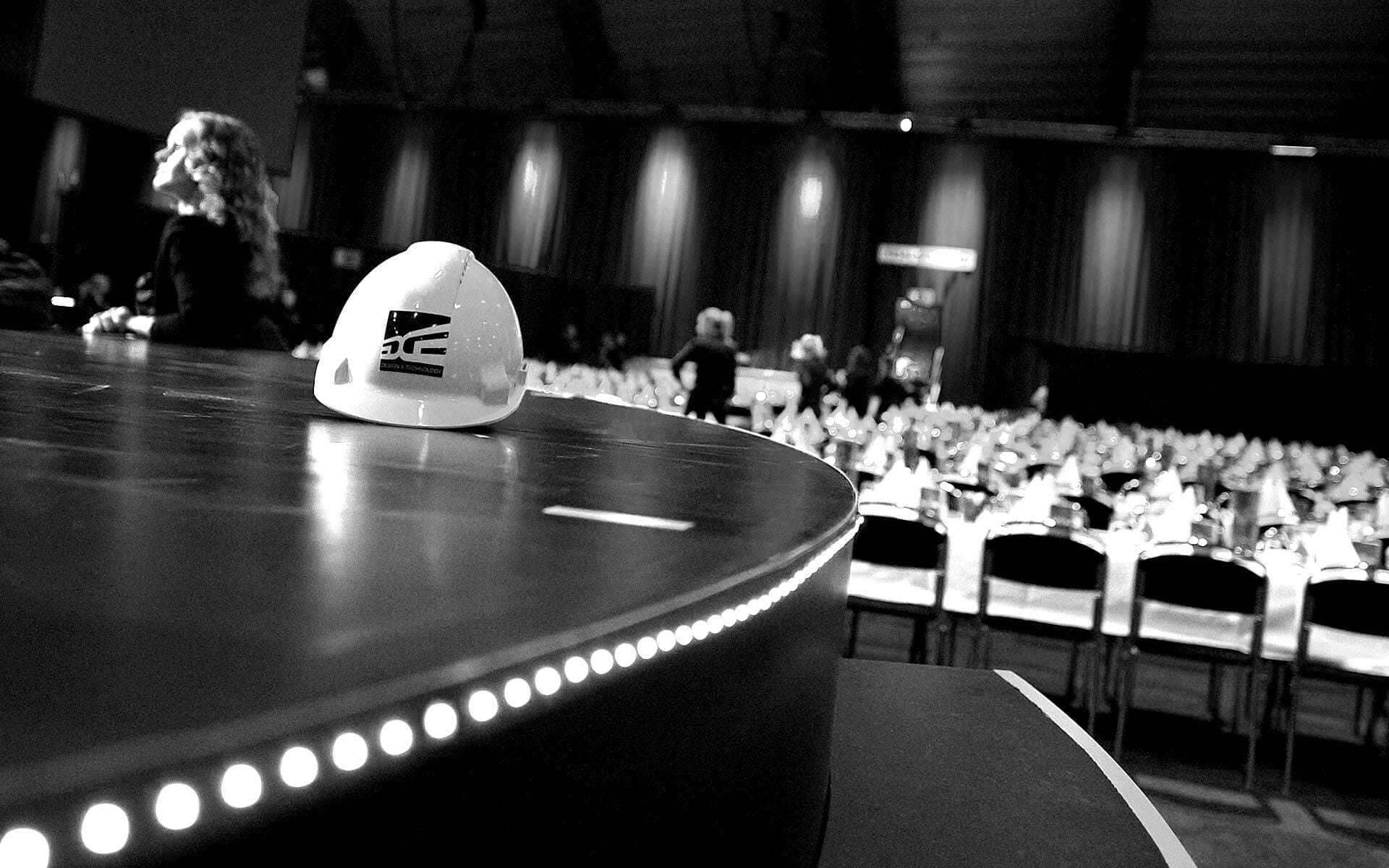 EDGE hard hat on stage deck during build of Sandvik 150th anniversary Göransson Arena