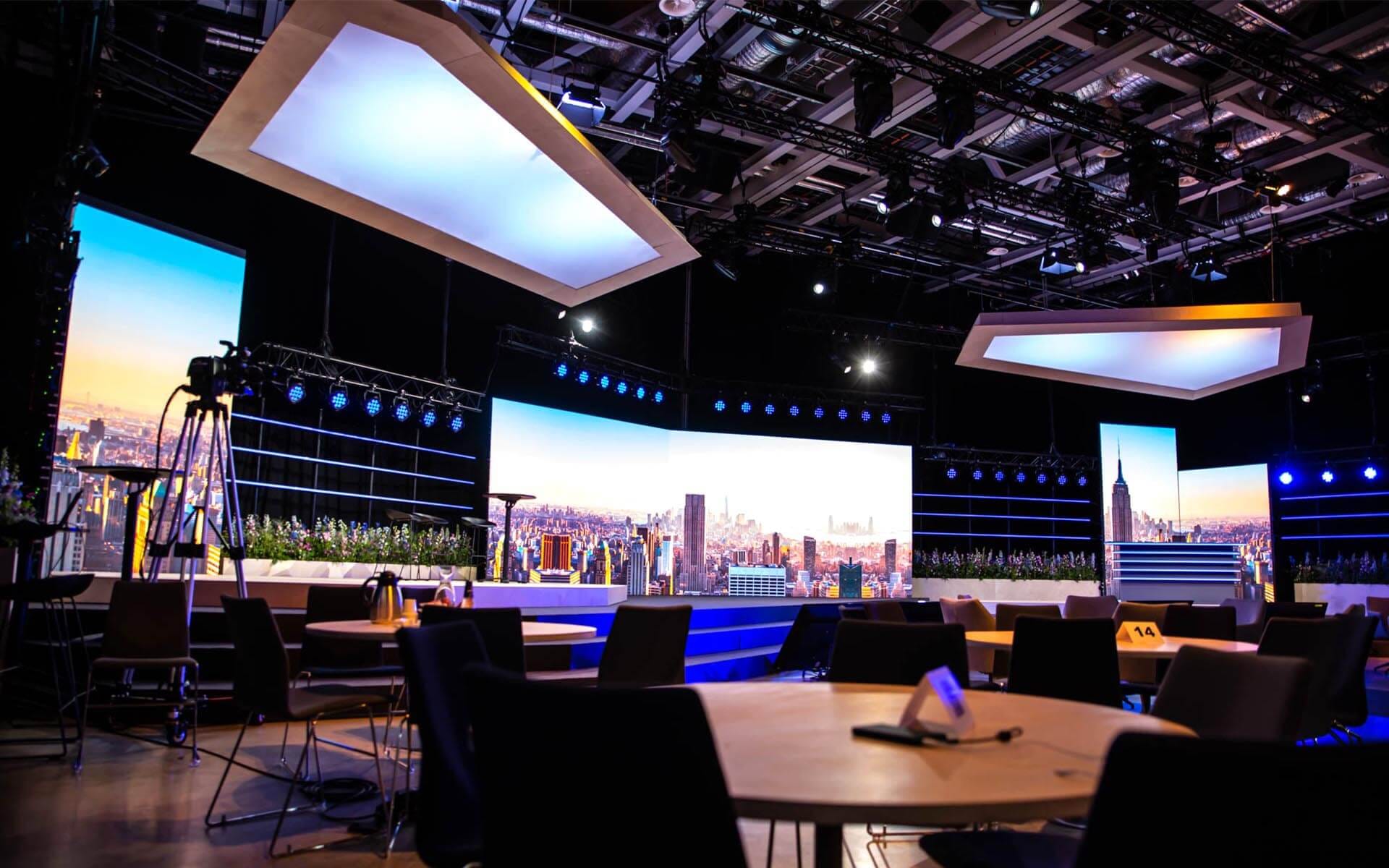Sandvik TMM stage at Strawberry Fields – a custom-built stage canopy frames the stage and gives the meeting a clear focal point.