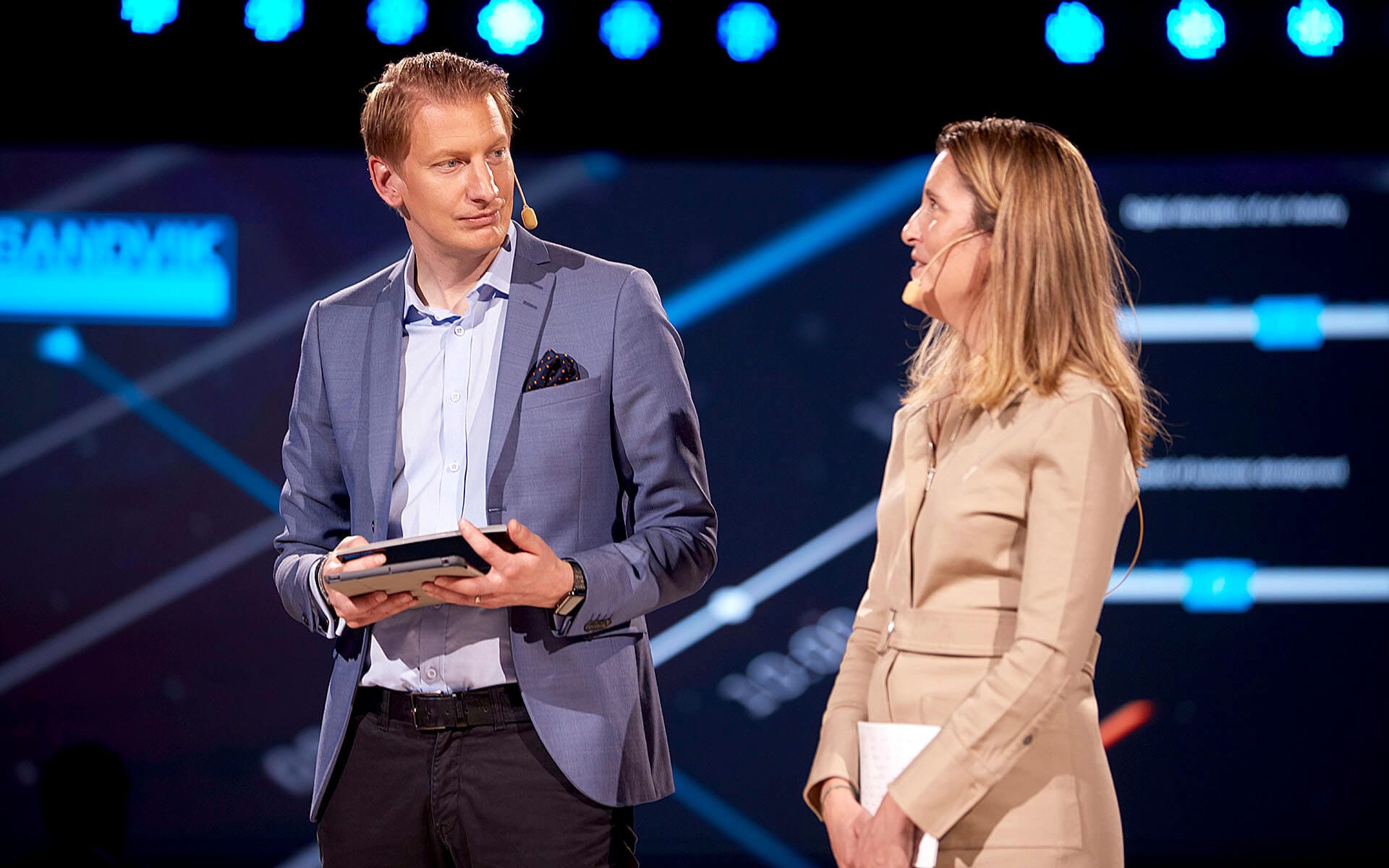 Moderators on stage during Sandvik TMM 2022 in Strawberry Fields