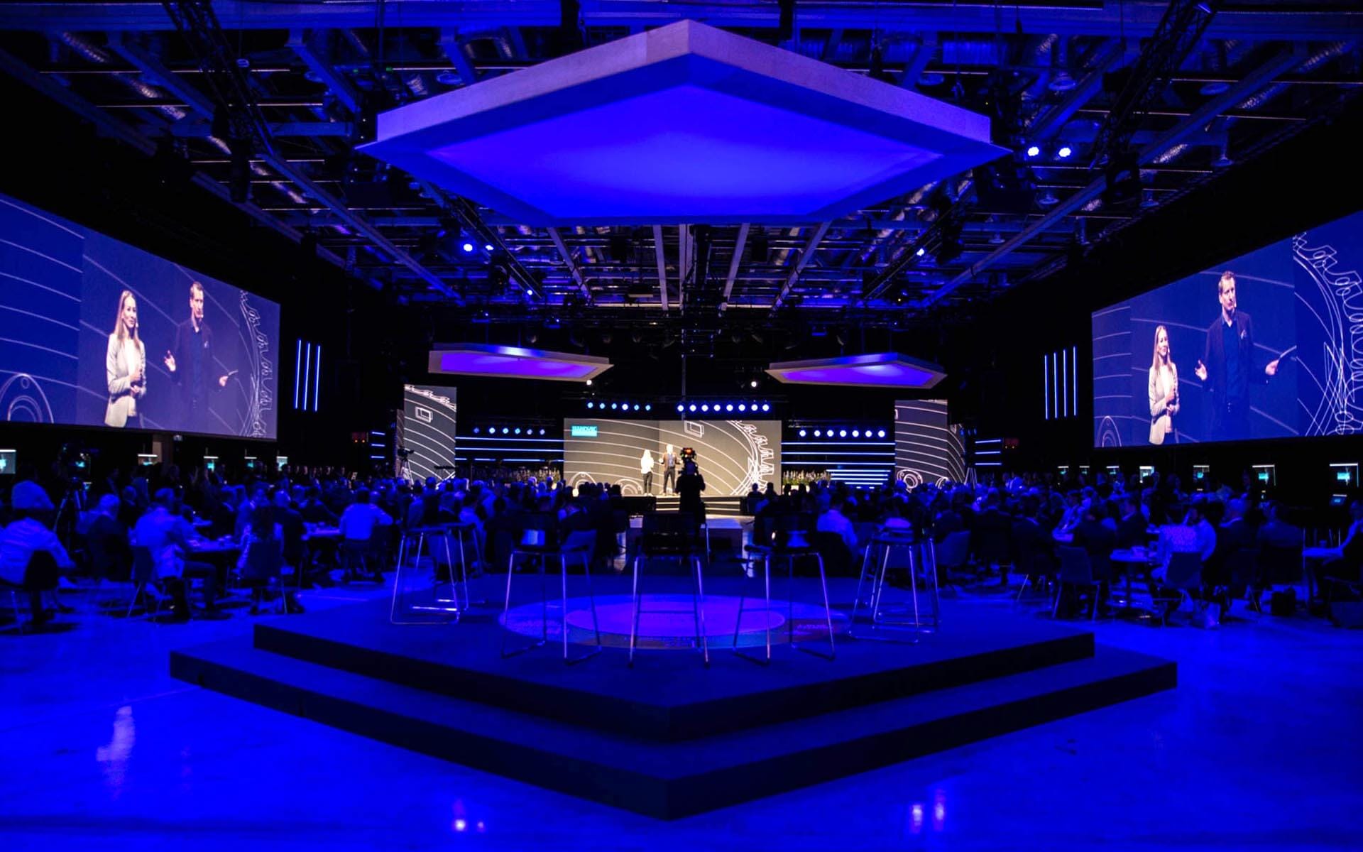 Full seating area coloured with LED ambient lighting, Sandvik TMM 2022 Strawberry Fields Quality Hotel™ Strawberry Arena