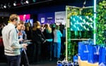 Produktdemo på skärm i Schibsteds mässmonter, NextM Annexet