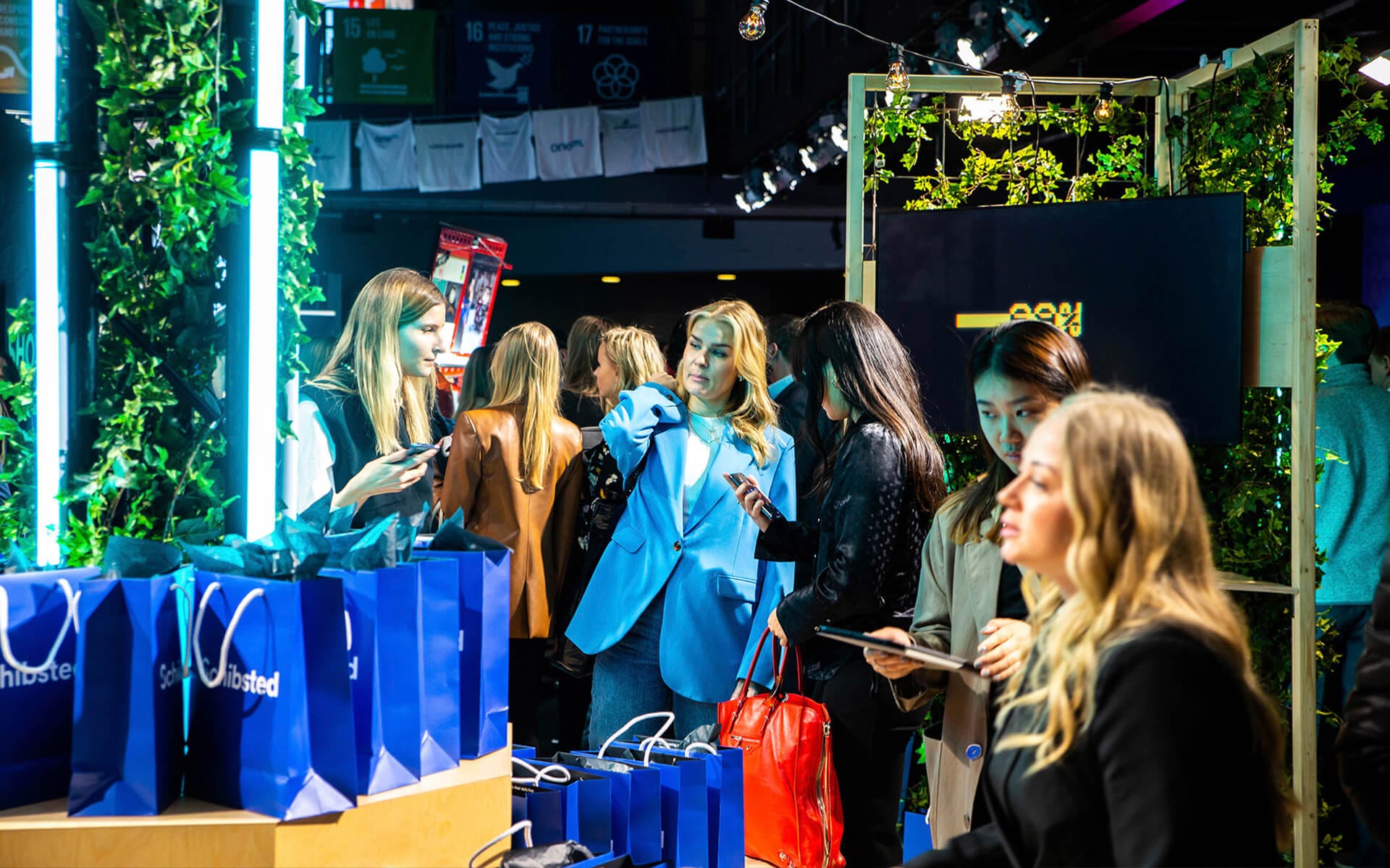 Giveaways in built-in storage of seating unit, Schibsted stand NextM Annexet