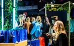 Give-aways i inbyggd förvaring i sittmöbeln, Schibsted mässmonter NextM Annexet