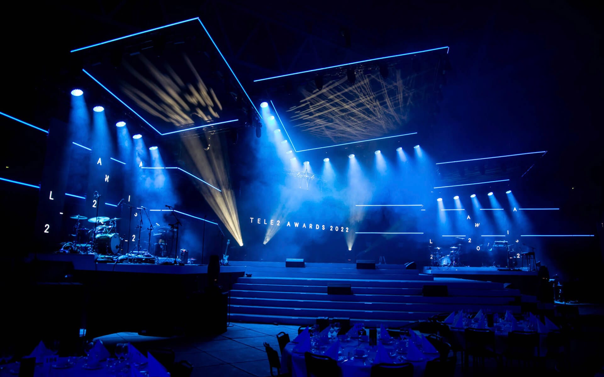 Gobo projection from moving fixtures on stage, Tele2 Awards 2022 3Arena