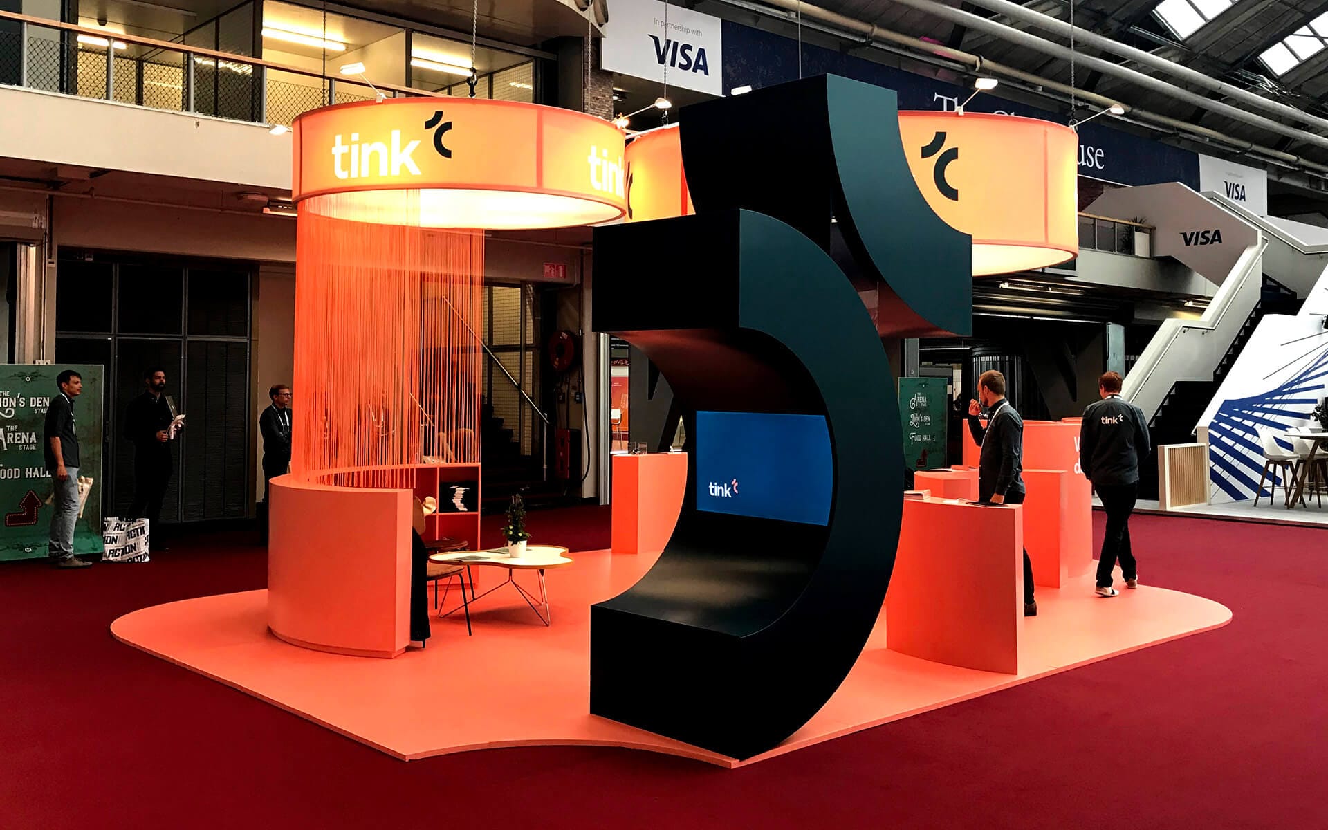 Tink round stand at Money 20/20 in Amsterdam – a distinctive circular stand design that stands out on the show floor and draws visitor flow from all directions.