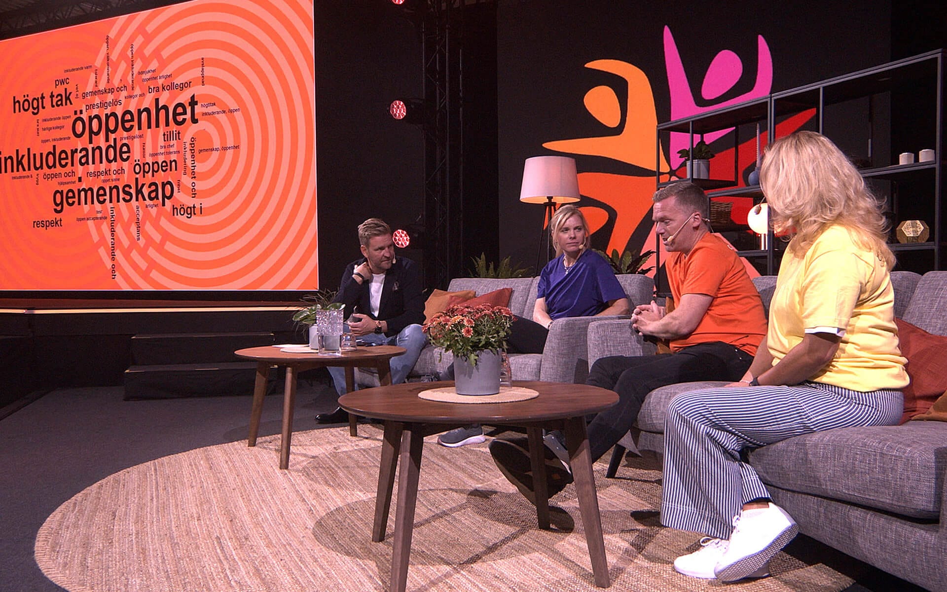Seated panel dialogue on stage during conference session, TUR-Spelen 2022 Stadium Arena Norrköping